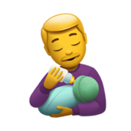 man feeding baby
