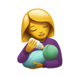 woman feeding baby