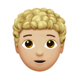 person: medium-light skin tone, curly hair